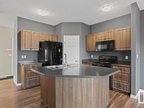 A-6805 47 Street, Cold Lake, AB - Indoor Photo Showing Kitchen With Double Sink