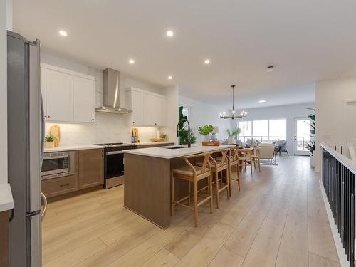 161 Stonehouse Way, Leduc, AB - Indoor Photo Showing Kitchen With Stainless Steel Kitchen With Upgraded Kitchen