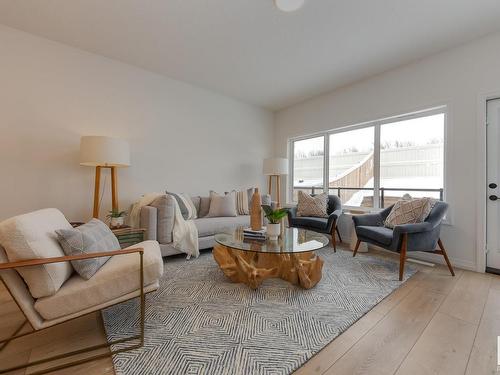 161 Stonehouse Way, Leduc, AB - Indoor Photo Showing Living Room