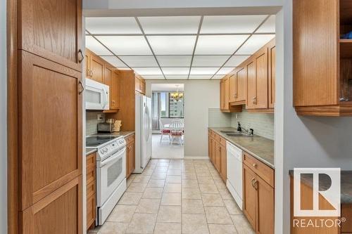 704 9921 104 Street, Edmonton, AB - Indoor Photo Showing Kitchen With Double Sink