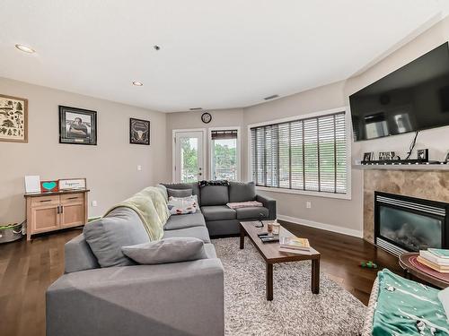 216 35 Sturgeon Road, St. Albert, AB - Indoor Photo Showing Living Room With Fireplace