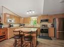 49 Neilson Dr., Rural Athabasca County, AB  - Indoor Photo Showing Kitchen With Double Sink 