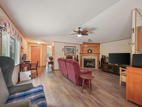 49 Neilson Dr., Rural Athabasca County, AB - Indoor Photo Showing Living Room With Fireplace