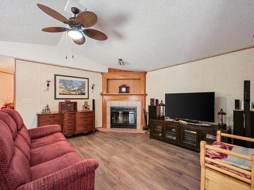 49 Neilson Dr., Rural Athabasca County, AB - Indoor Photo Showing Living Room With Fireplace