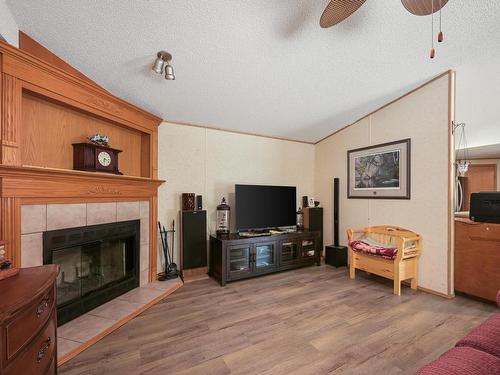 49 Neilson Dr., Rural Athabasca County, AB - Indoor Photo Showing Living Room With Fireplace