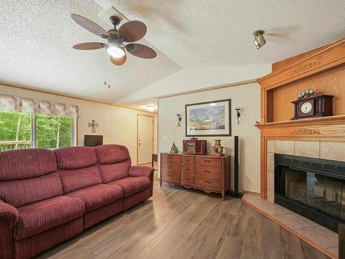 49 Neilson Dr., Rural Athabasca County, AB - Indoor Photo Showing Living Room With Fireplace