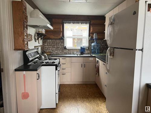 58227 Rng Rd 70 A, Rural St. Paul County, AB - Indoor Photo Showing Kitchen With Double Sink