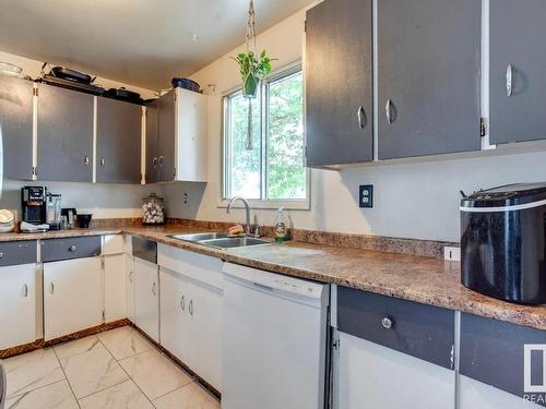 14528 34 Street, Edmonton, AB - Indoor Photo Showing Kitchen With Double Sink