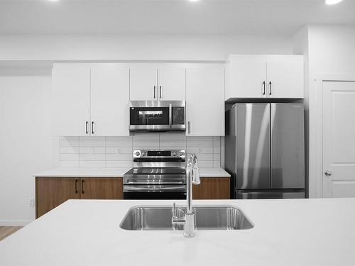 301 9227 228 Street, Edmonton, AB - Indoor Photo Showing Kitchen With Stainless Steel Kitchen With Double Sink With Upgraded Kitchen