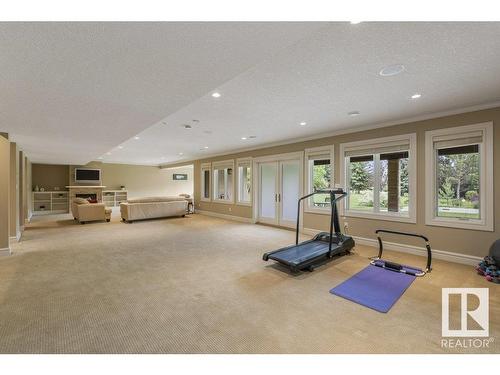 80 Riverstone Close, Rural Sturgeon County, AB - Indoor Photo Showing Gym Room