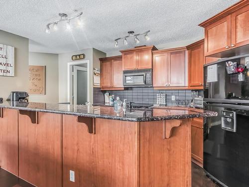 1705 9020 Jasper Avenue, Edmonton, AB - Indoor Photo Showing Kitchen