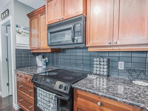 1705 9020 Jasper Avenue, Edmonton, AB - Indoor Photo Showing Kitchen With Upgraded Kitchen