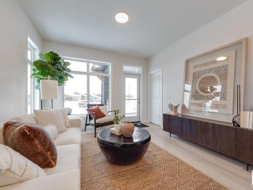 166 Stonehouse Way, Leduc, AB - Indoor Photo Showing Living Room