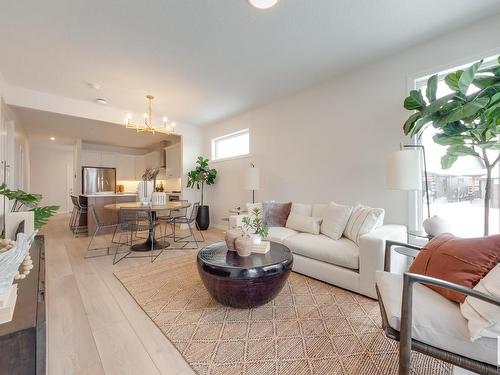 166 Stonehouse Way, Leduc, AB - Indoor Photo Showing Living Room