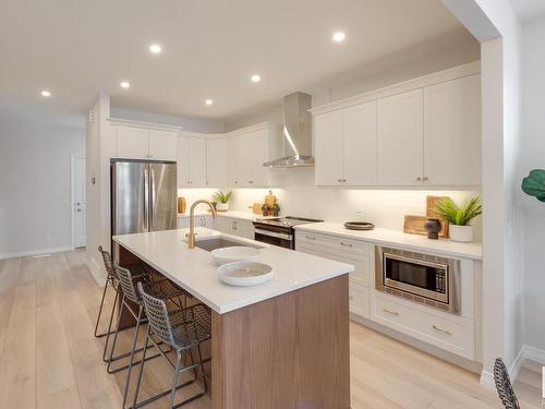 166 Stonehouse Way, Leduc, AB - Indoor Photo Showing Kitchen With Stainless Steel Kitchen With Upgraded Kitchen