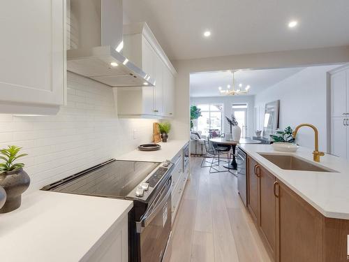 166 Stonehouse Way, Leduc, AB - Indoor Photo Showing Kitchen With Upgraded Kitchen