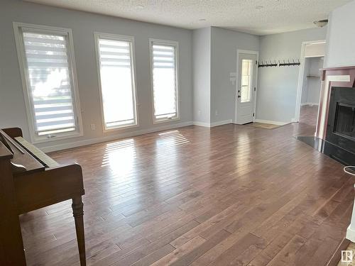 17932 93 Avenue Nw, Edmonton, AB - Indoor Photo Showing Living Room With Fireplace