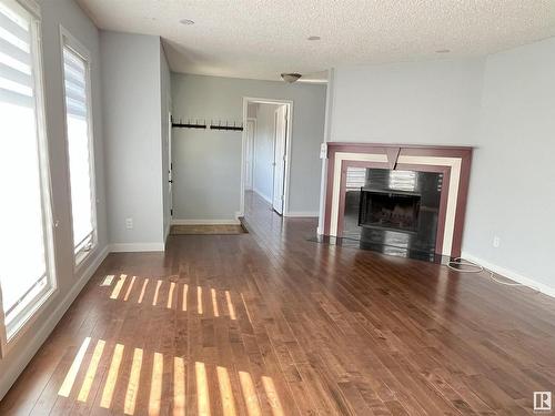 17932 93 Avenue Nw, Edmonton, AB - Indoor Photo Showing Living Room With Fireplace