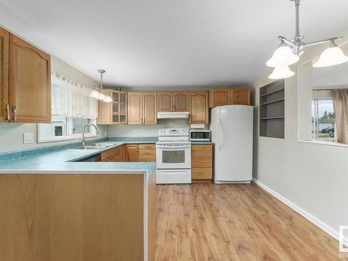 4308 48 Avenue, Bonnyville Town, AB - Indoor Photo Showing Kitchen With Double Sink