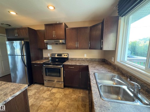 5302 Railway Avenue, Elk Point, AB - Indoor Photo Showing Kitchen With Double Sink