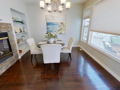 2036 Towne Centre Boulevard, Edmonton, AB - Indoor Photo Showing Dining Room With Fireplace