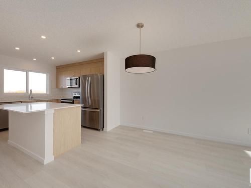 2448 Trumpeter Way, Edmonton, AB - Indoor Photo Showing Kitchen