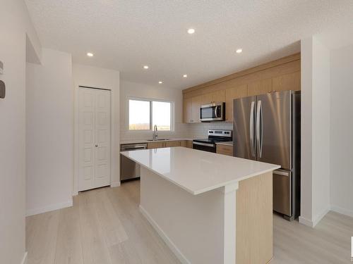 2448 Trumpeter Way, Edmonton, AB - Indoor Photo Showing Kitchen With Stainless Steel Kitchen With Upgraded Kitchen