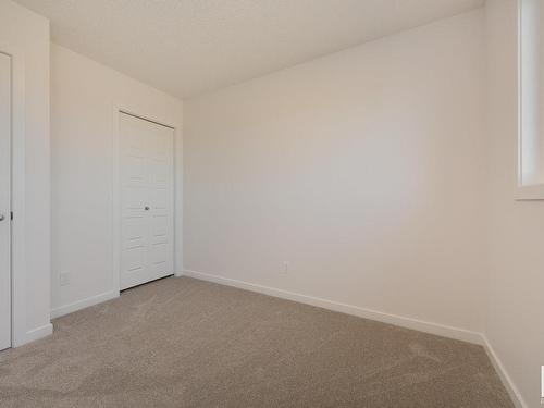 2448 Trumpeter Way, Edmonton, AB - Indoor Photo Showing Other Room