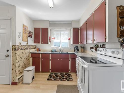 4715 47 Avenue, Cold Lake, AB - Indoor Photo Showing Kitchen With Double Sink