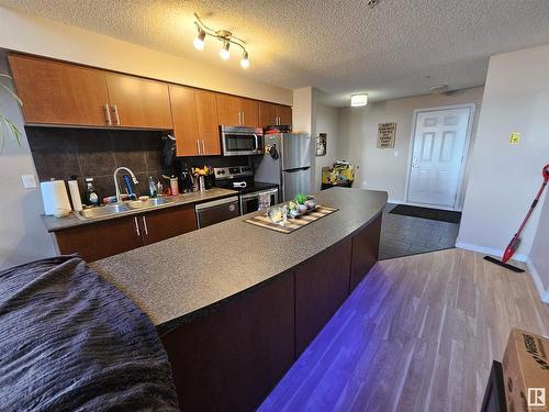 412 10118 106 Avenue, Edmonton, AB - Indoor Photo Showing Kitchen With Double Sink