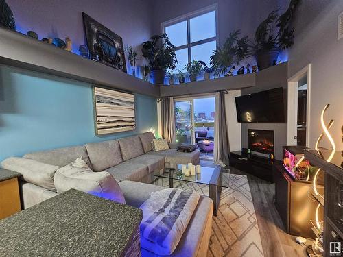 410 10118 106 Avenue, Edmonton, AB - Indoor Photo Showing Living Room With Fireplace