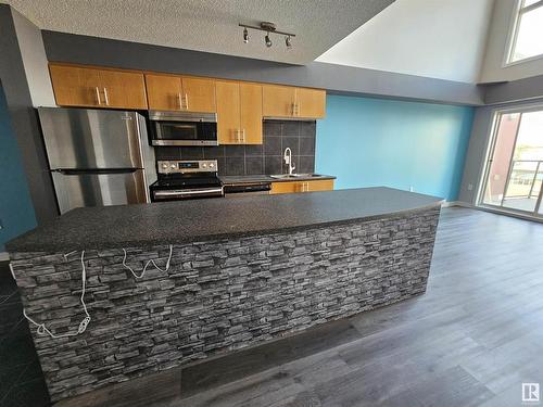 410 10118 106 Avenue, Edmonton, AB - Indoor Photo Showing Kitchen With Stainless Steel Kitchen