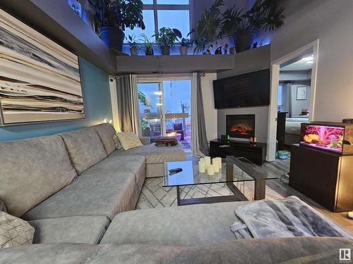 410 10118 106 Avenue, Edmonton, AB - Indoor Photo Showing Living Room With Fireplace