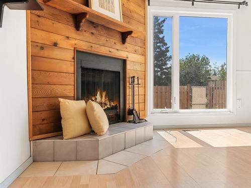 8612 38A Avenue, Edmonton, AB - Indoor Photo Showing Living Room With Fireplace