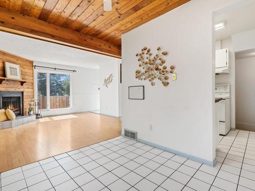 8612 38A Avenue, Edmonton, AB - Indoor Photo Showing Other Room With Fireplace