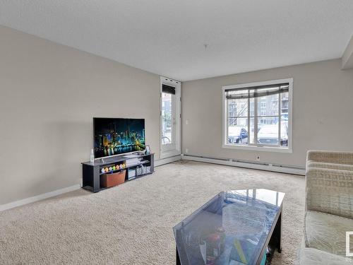 106 3211 James Mowatt Trail, Edmonton, AB - Indoor Photo Showing Living Room