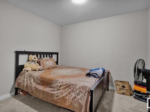 106 3211 James Mowatt Trail, Edmonton, AB - Indoor Photo Showing Bedroom