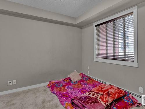 106 3211 James Mowatt Trail, Edmonton, AB - Indoor Photo Showing Bedroom