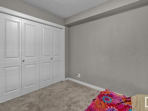 106 3211 James Mowatt Trail, Edmonton, AB - Indoor Photo Showing Bedroom