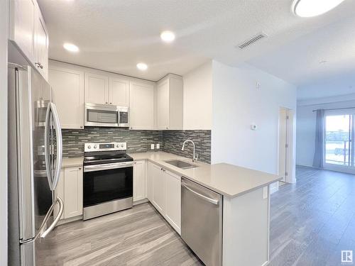 213 1316 Windermere Way, Edmonton, AB - Indoor Photo Showing Kitchen With Upgraded Kitchen