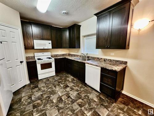 5029 51 Avenue, St. Paul Town, AB - Indoor Photo Showing Kitchen With Double Sink