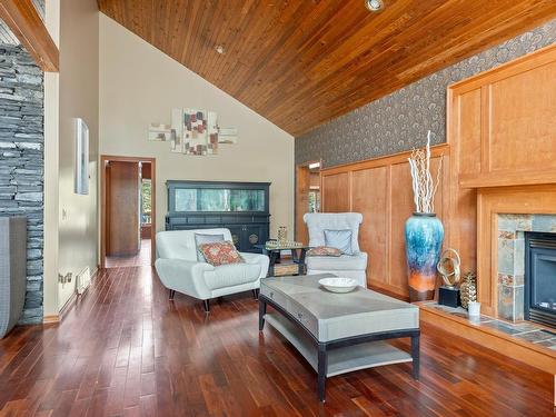 40-54006 Rge Rd 261, Rural Sturgeon County, AB - Indoor Photo Showing Living Room With Fireplace