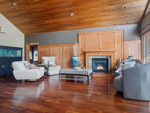 40-54006 Rge Rd 261, Rural Sturgeon County, AB - Indoor Photo Showing Living Room With Fireplace