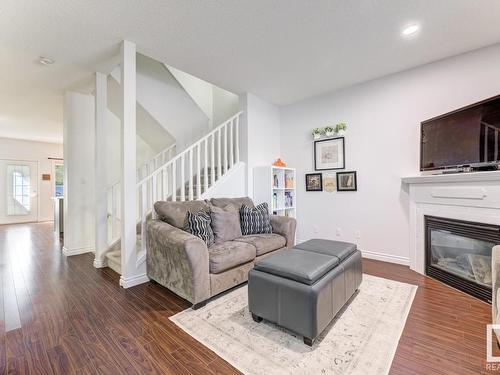 9105 98 Avenue, Edmonton, AB - Indoor Photo Showing Living Room With Fireplace