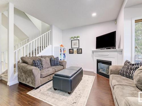 9105 98 Avenue, Edmonton, AB - Indoor Photo Showing Living Room With Fireplace