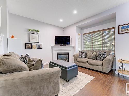 9105 98 Avenue, Edmonton, AB - Indoor Photo Showing Living Room With Fireplace