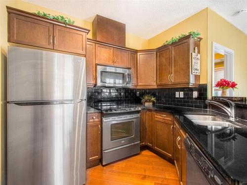 202 7907 109 Street, Edmonton, AB - Indoor Photo Showing Kitchen With Double Sink