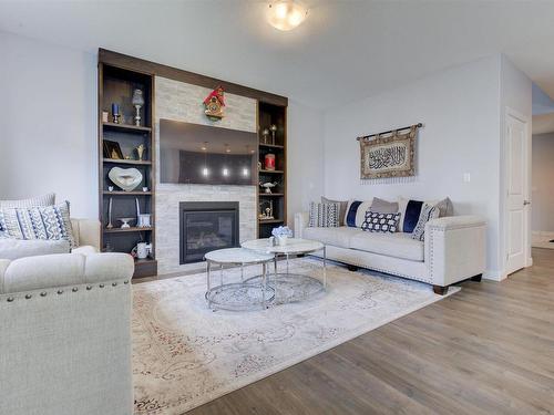 8452 Cushing Court, Edmonton, AB - Indoor Photo Showing Living Room With Fireplace