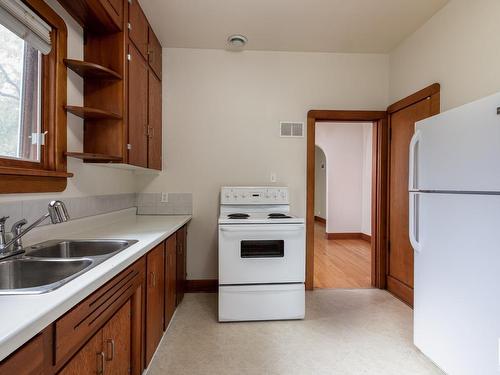 10440 University Avenue, Edmonton, AB - Indoor Photo Showing Kitchen With Double Sink