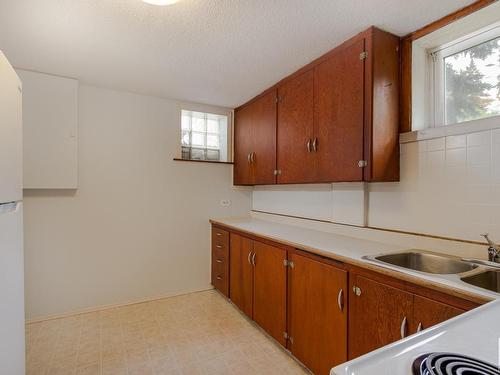 10440 University Avenue, Edmonton, AB - Indoor Photo Showing Kitchen With Double Sink